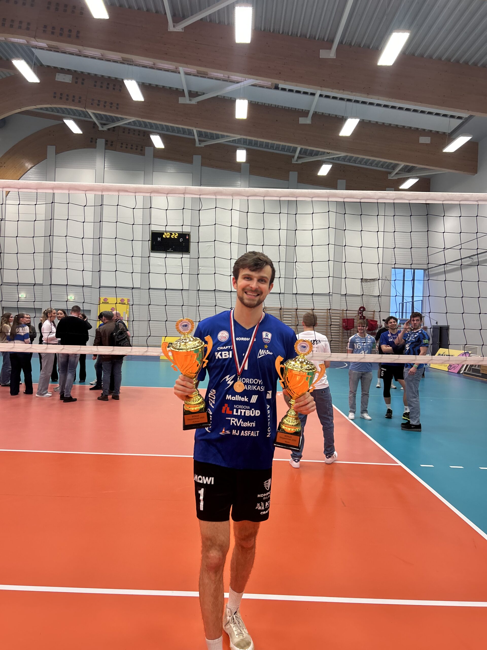 Alain Pineault in competition or holding a trophy